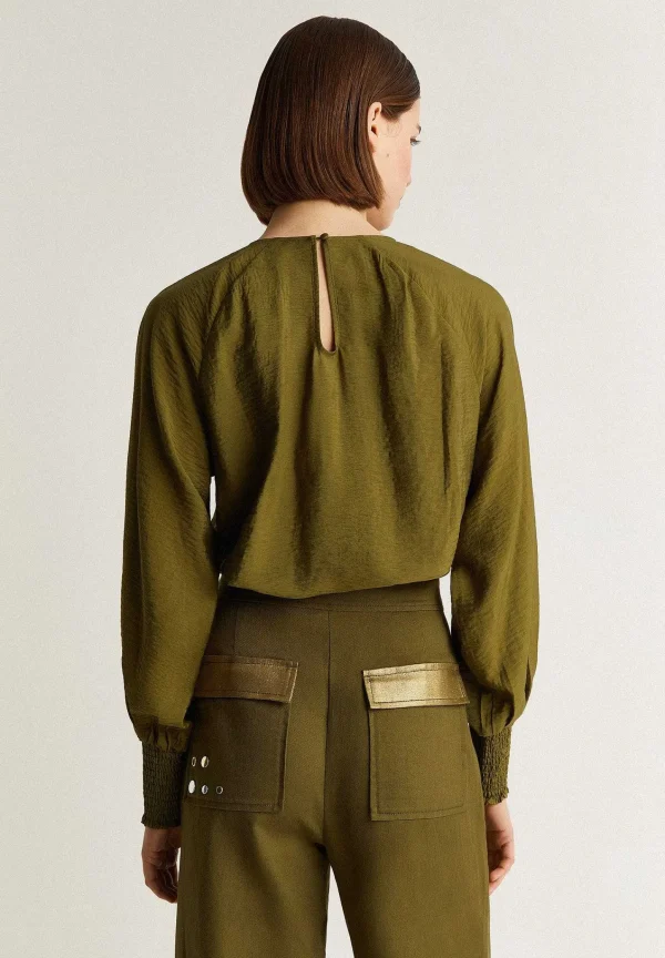 Sale Scalpers Blusa Detalle Aberturas