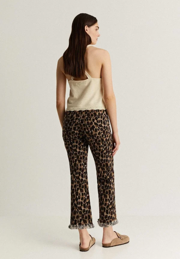 New Scalpers Pantalon Animal Print Bajo Desflecado